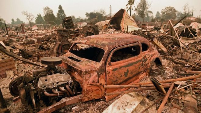 Carr wildfire damage image via BBC and AP